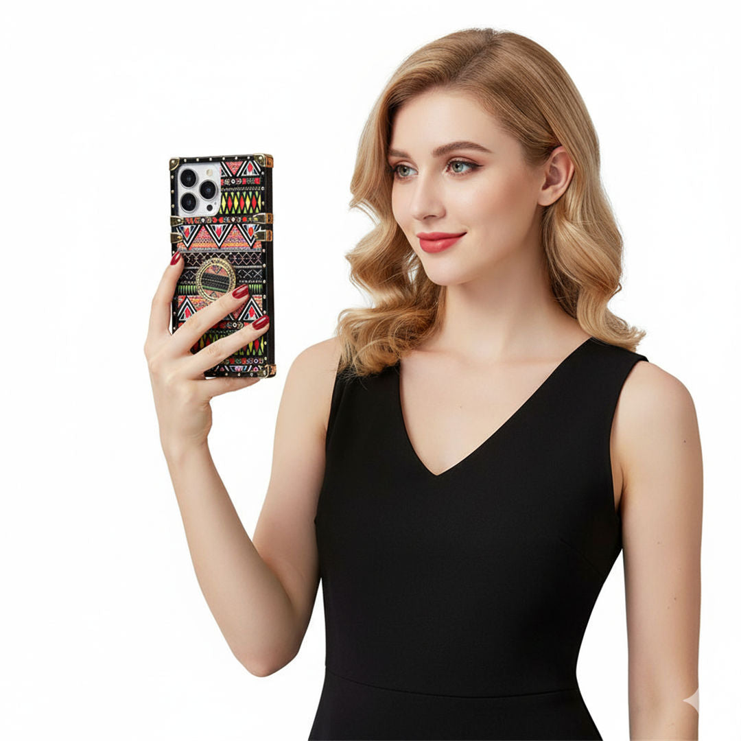 Woman holding a phone with a colorful case against a white background