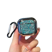 Turquoise glittery Airpods case with black carabiner