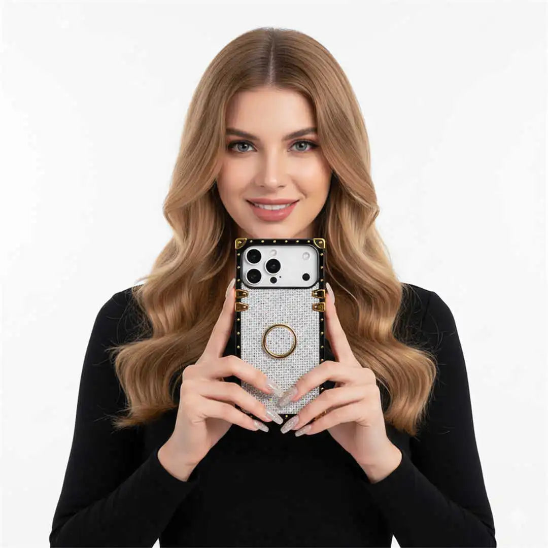 Woman holding a smartphone with a decorative case against a white background