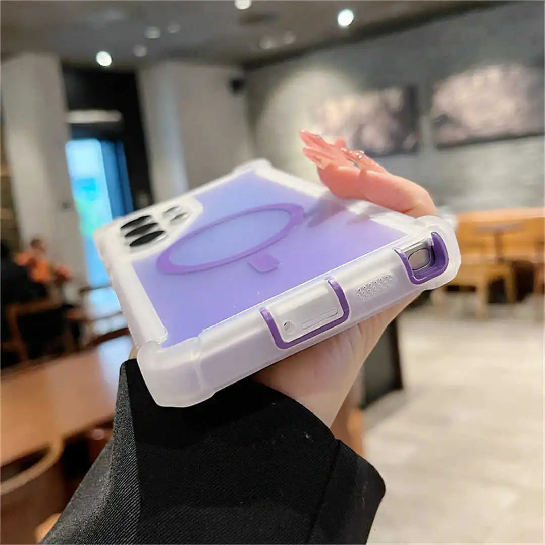 A phone case with a purple design held by a person