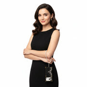 Woman in a black dress holding a phone case with a white background