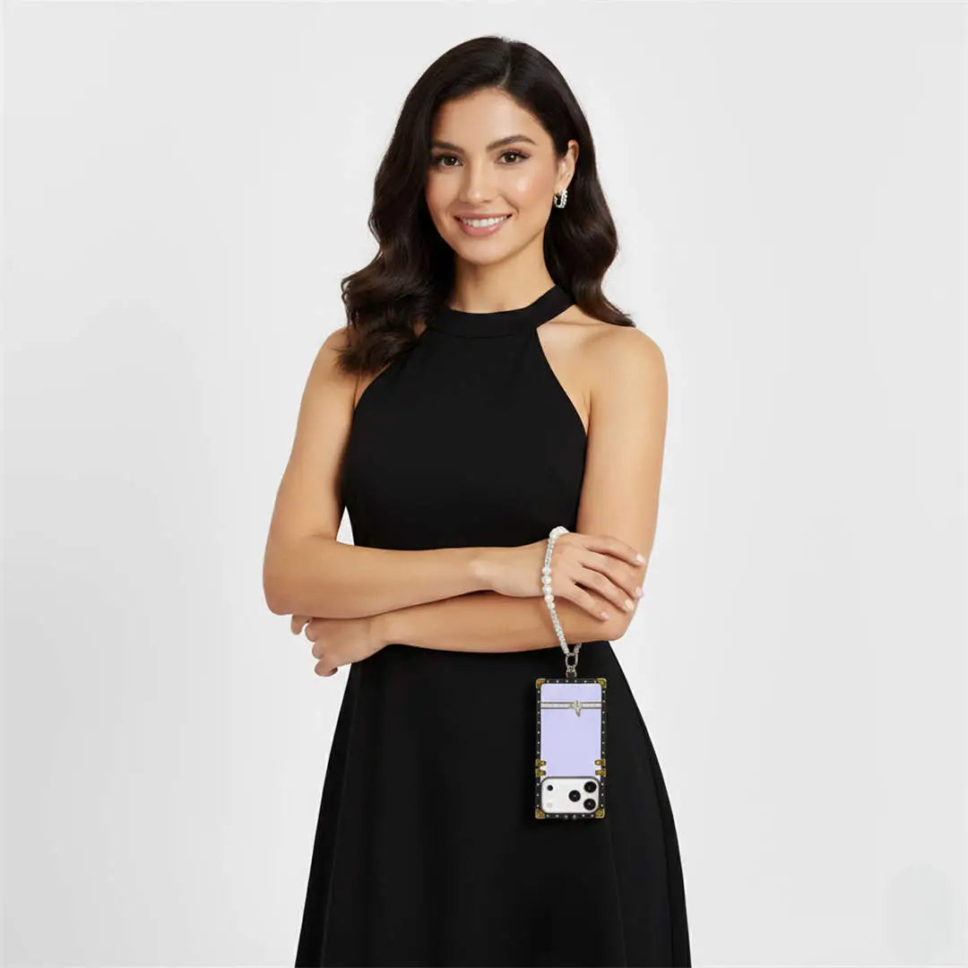 Woman wearing a black dress with a wristlet iPhone 17 pro case