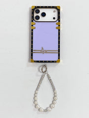 iPhone 17 Pro case with butterfly charm and pearl strap on a white background