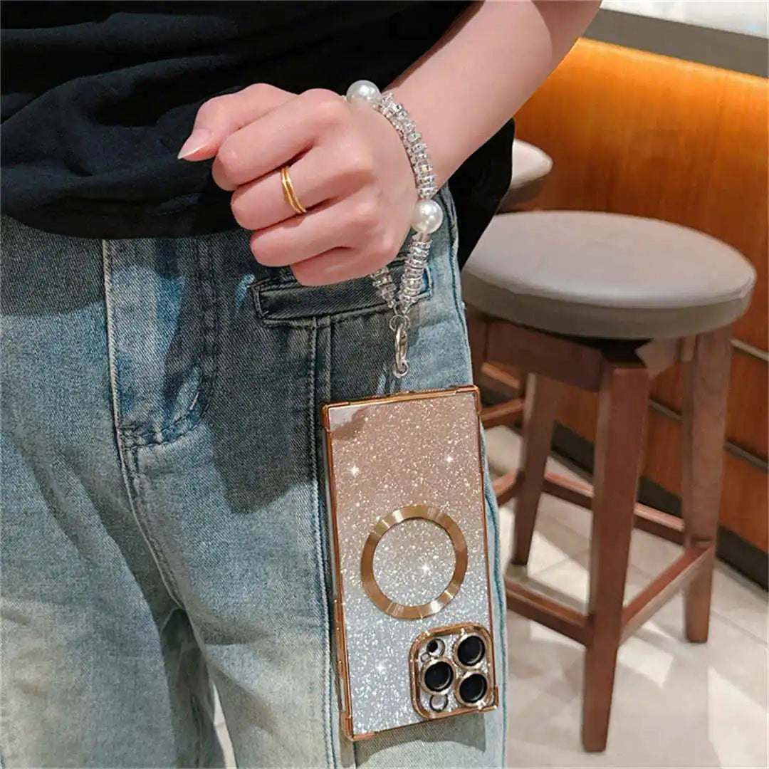 Person wearing a glittery phone case with a blurred background