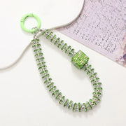 Green phone charm with cube