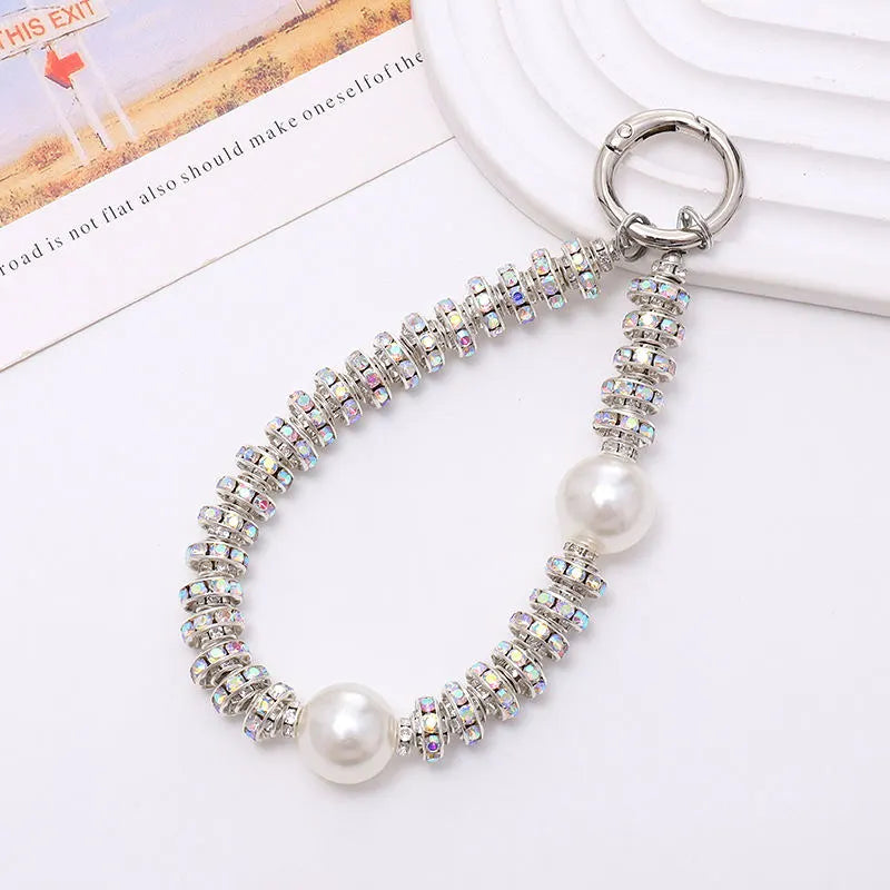 silver phone charm with 2 pearls