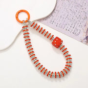 Red phone charm with cube