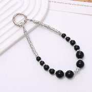 silver phone charm with black pearls