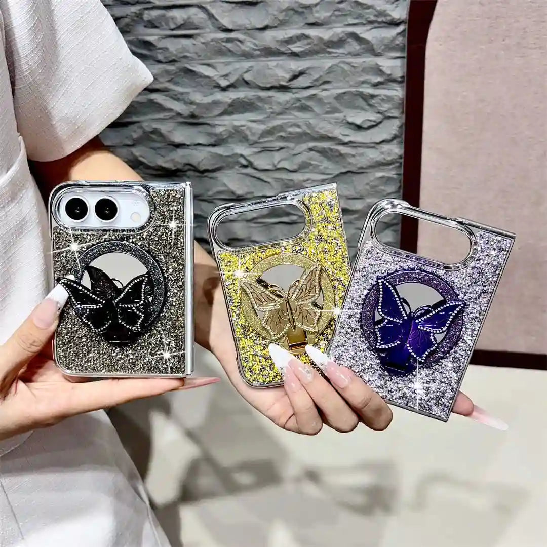 Black, gold and purple Duo Butterfly Gleam cases held together to show their butterfly stands