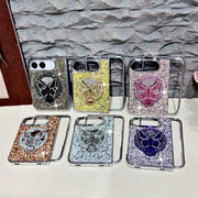 Six Duo Butterfly Gleam glitter cases displayed in black, gold, pink, orange, silver and purple