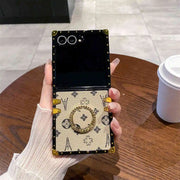 classic leather Galaxy Z flip 7 case with ring held by a hand