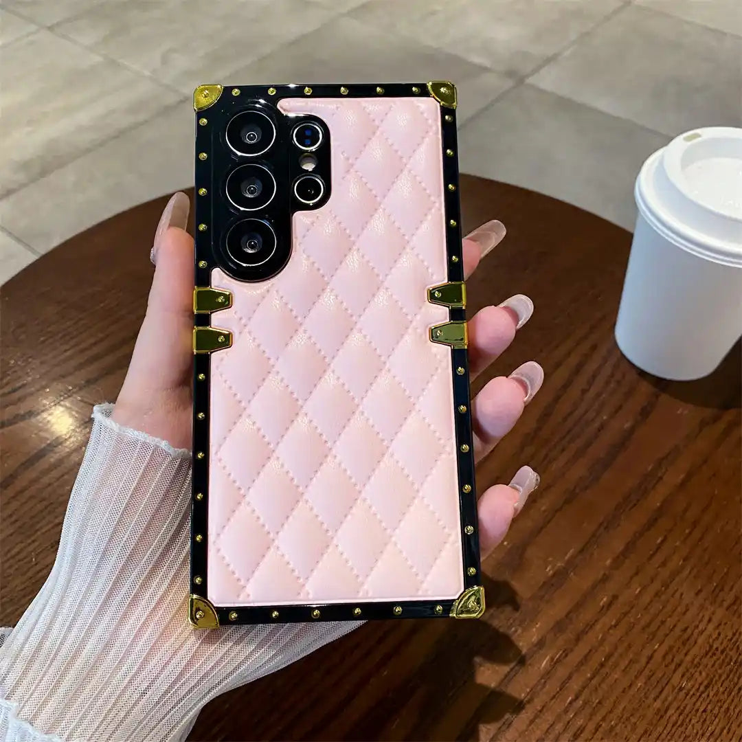 pink quilted Galaxy S26 Ultra trunk phone case in hand