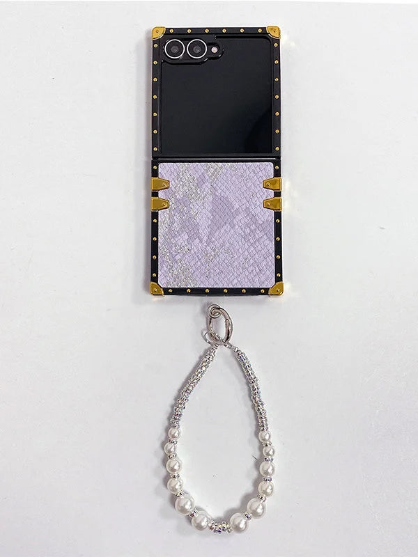 Snakeskin Galaxy Z flip 7 Phone case with decorative chain on a white background