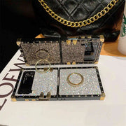 glitter Z flip 3 case with ring on a magazine cover.