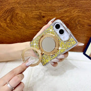Gold Mirror Halo Duo case with its hinged ring lifted away from the circular mirror