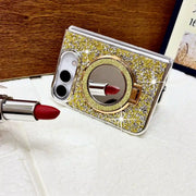 Gold Mirror Halo Duo case propped horizontally with its circular mirror reflecting a lipstick
