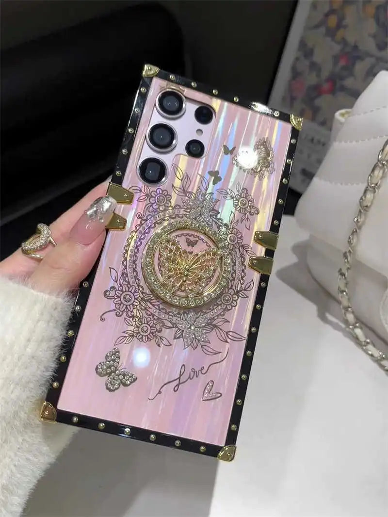 Close-up of the pink Aurora Galaxy Trunk Samsung case showing its iridescent finish and butterfly ring stand