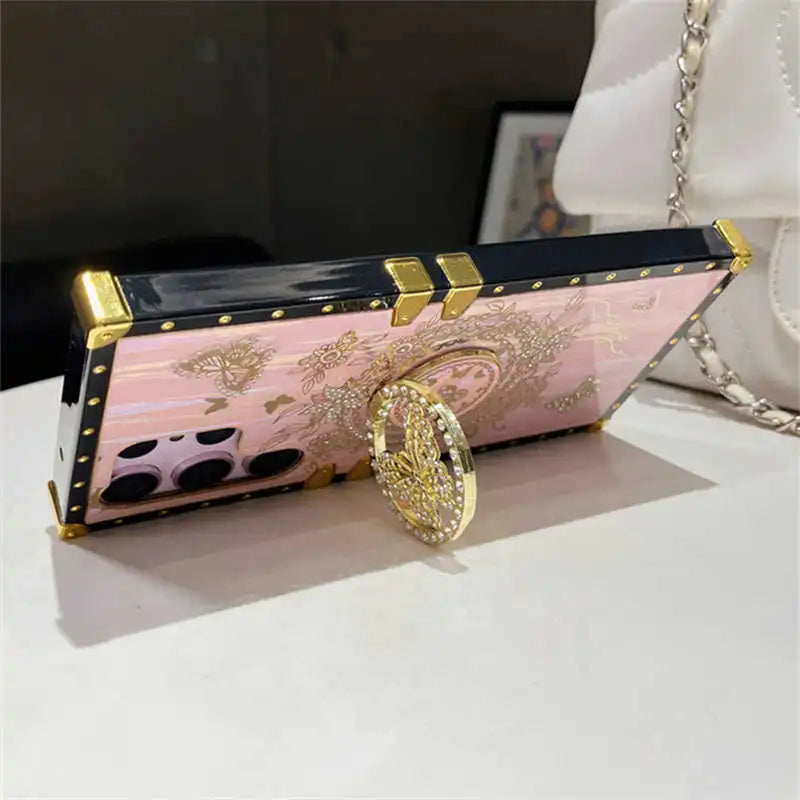 Pink Aurora Galaxy Trunk Samsung case propped horizontally on its butterfly ring stand