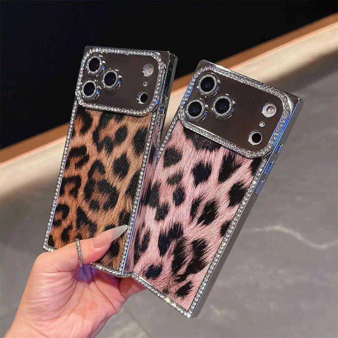 Brown and pink Leopard Chrome Spark iPhone cases displayed together in one hand
