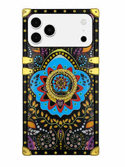A protective phone case with a black background and an intricate, colorful mandala pattern. The design features a large central blue and gold medallion surrounded by red, purple, and yellow floral motifs.