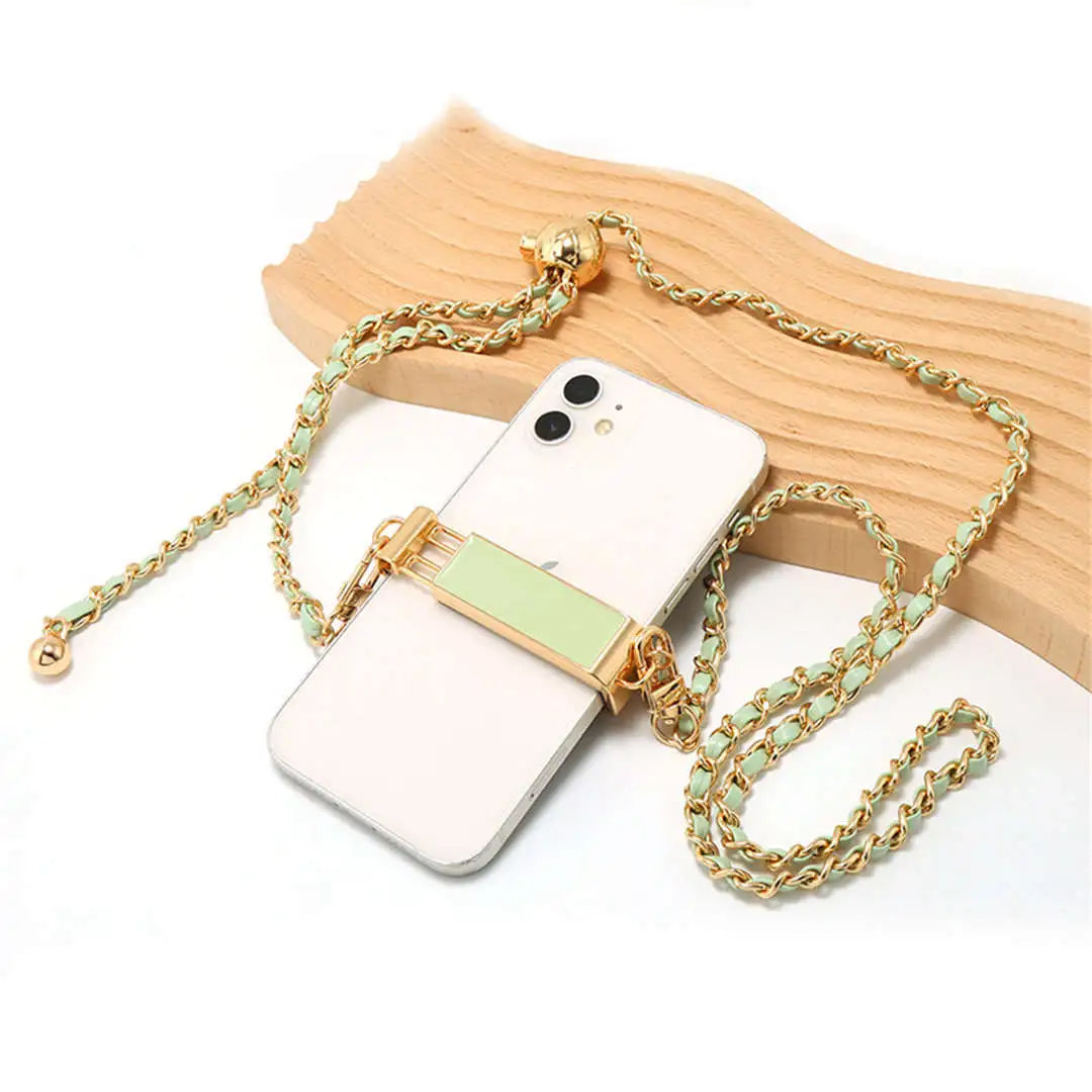 Phone case with gold chain on a white background