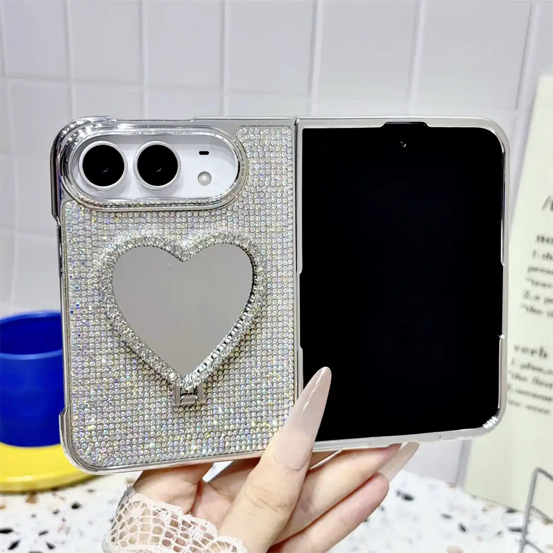 Open iPhone Duo in the silver Crystal Heart Duo case with rhinestone back and heart-shaped mirror