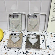 Four Crystal Heart Duo cases displayed in beige, silver, black and gold