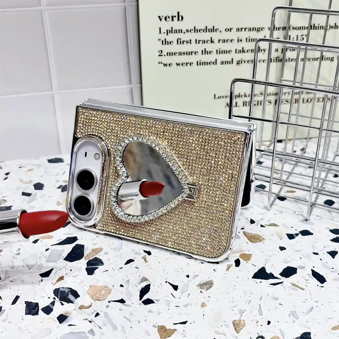 Gold Crystal Heart Duo case propped horizontally with heart-shaped mirror reflecting a lipstick