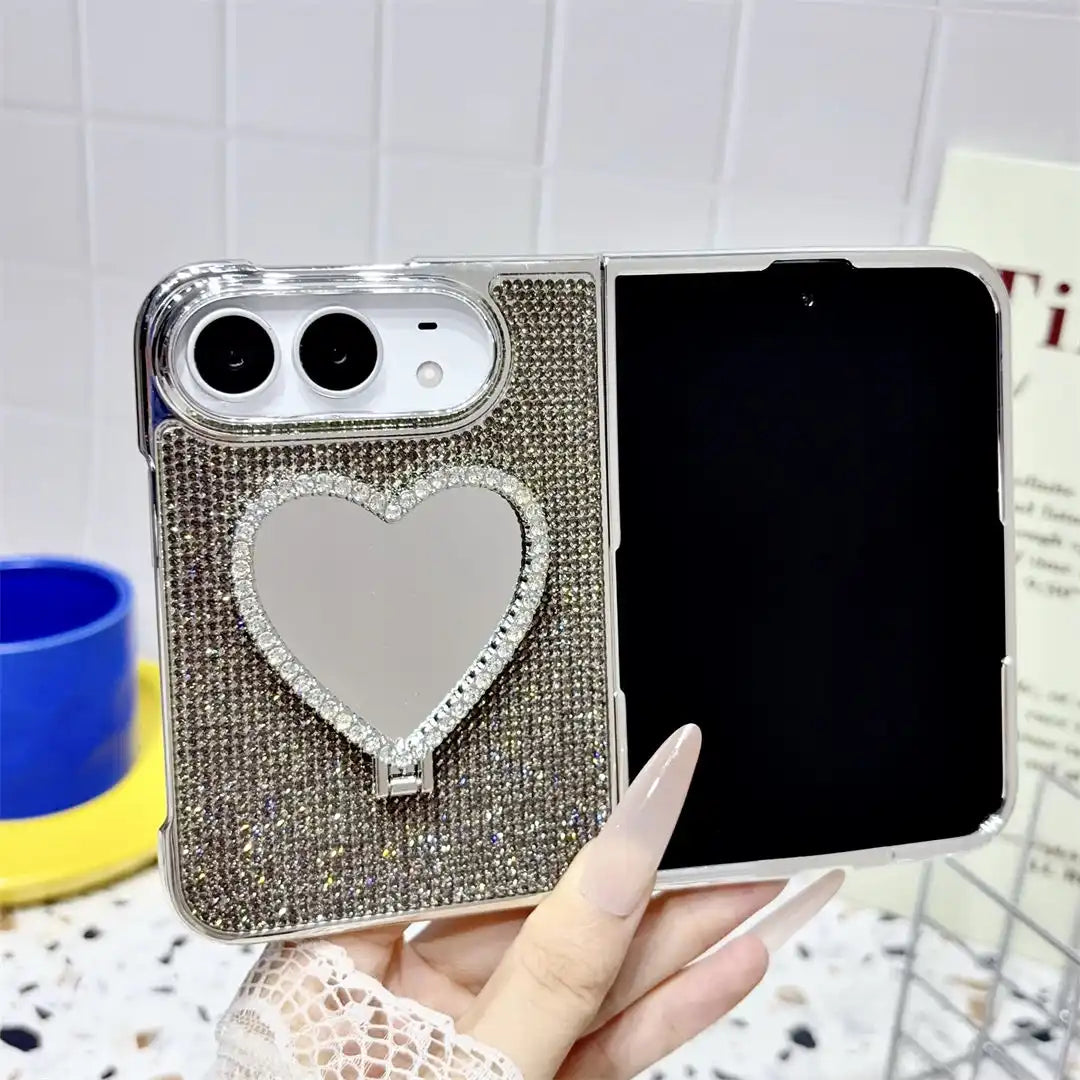 Open iPhone Duo in the black Crystal Heart Duo case with rhinestone back and heart-shaped mirror