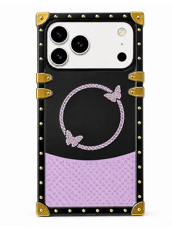 A protective phone case with a black and lavender purple color scheme, featuring a rhinestone-embellished circular arrow design with butterfly accents and gold-tone hardware.