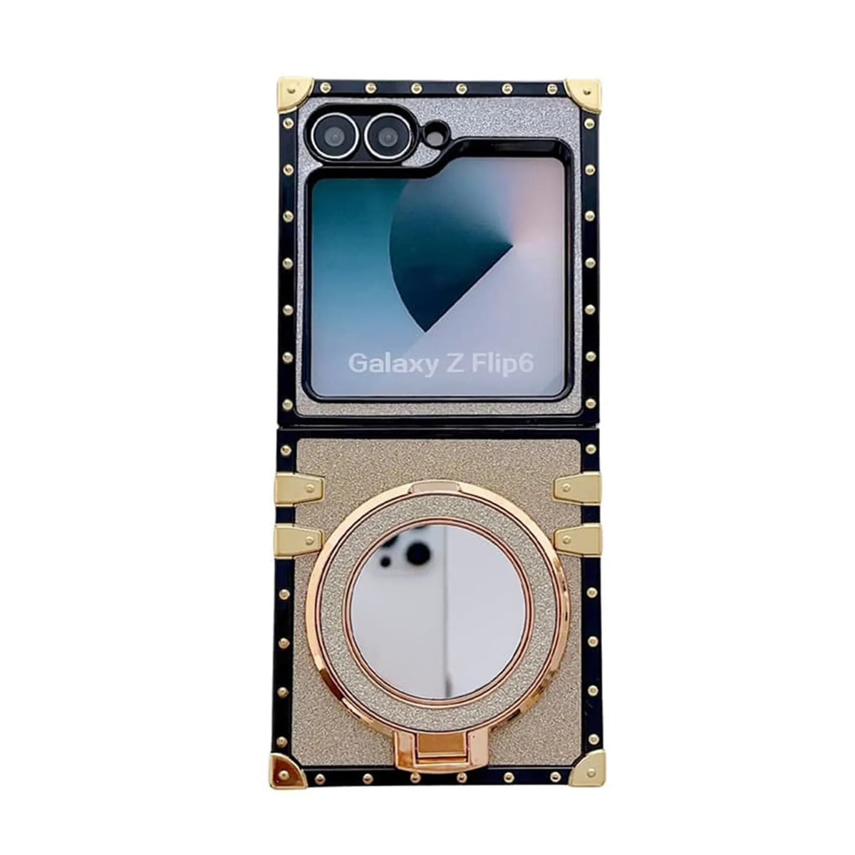 A luxury-style protective case for a Samsung Galaxy Z Flip 6 fold smartphone, shown open against a solid white background. The case features a black textured outer frame with gold-tone rivets and corner protectors, a glittery gold inner panel, and a rose gold metallic circular kickstand/mirror in the center.