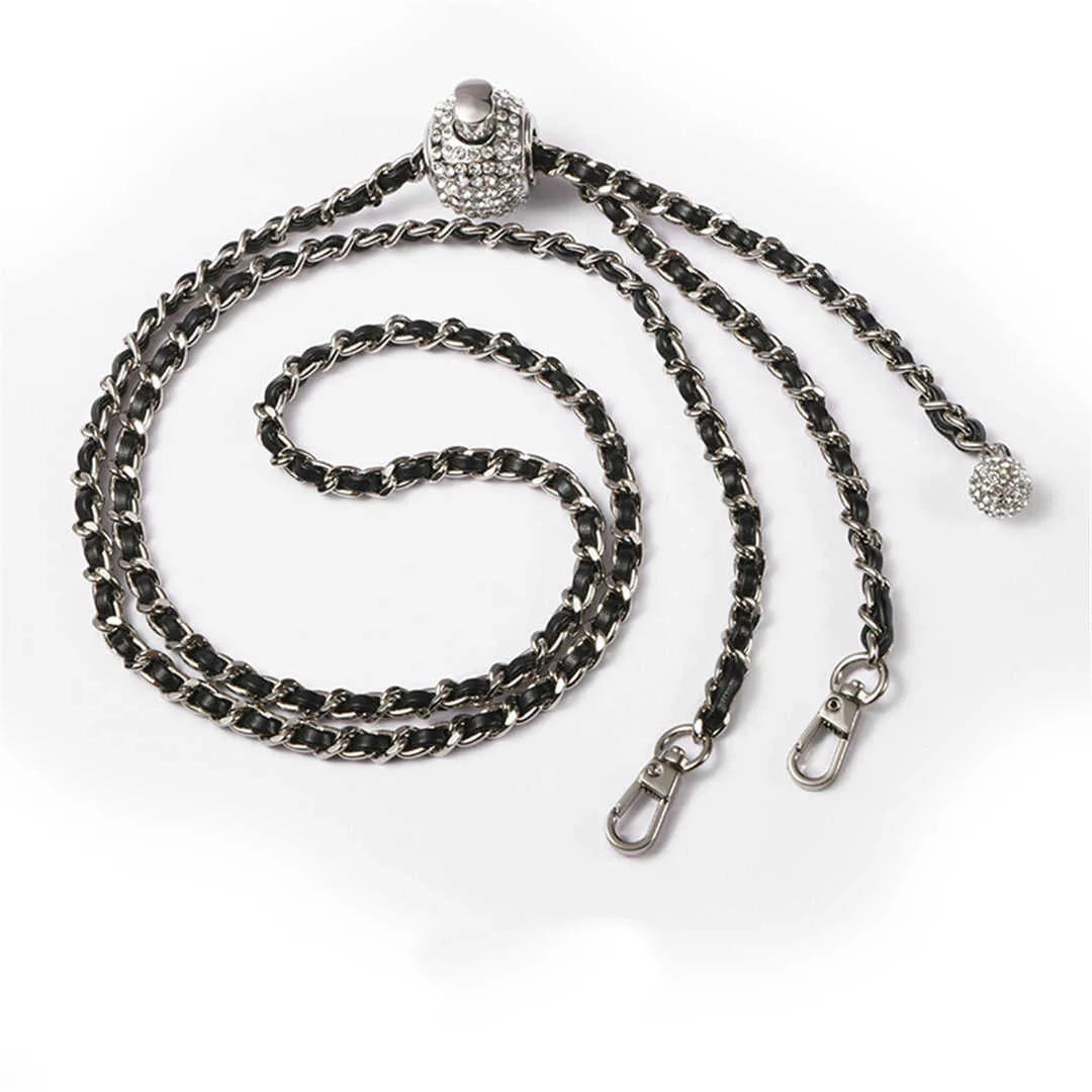 crossbody Silver chain with decorative clasp on a white background