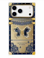 A luxury phone case featuring a gold and navy blue design with a central jeweled butterfly motif and ornate scrollwork, labeled 'LIMITED EDITION BUTTERFLY'.
