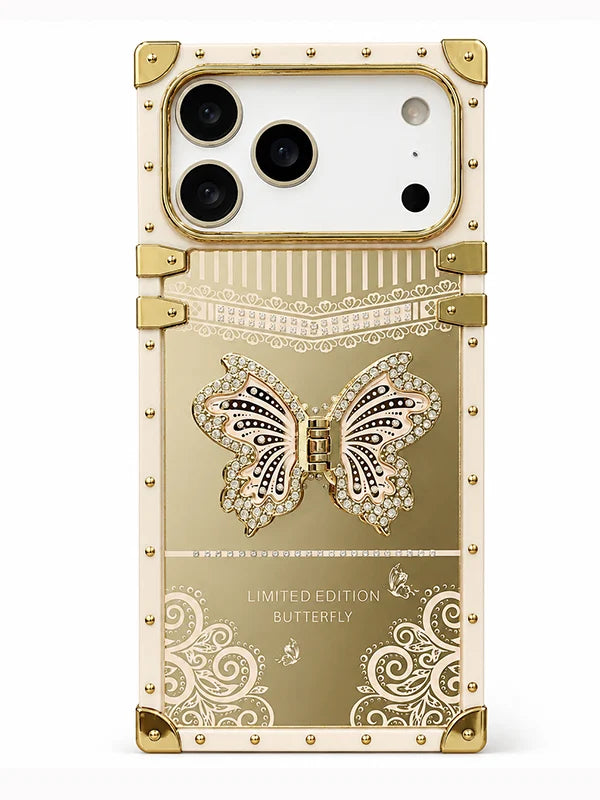 A luxury phone case designed for a Google Pixel, featuring a gold and cream color scheme with a prominent 3D butterfly embellishment on the back, decorative scrollwork, and gold-tone rivets and corner protectors.