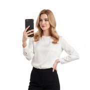 a female is taking a selfie with phone