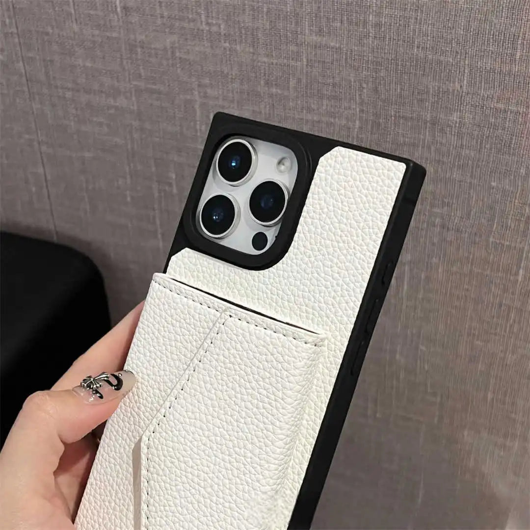 White phone case with textured finish held by a hand against a gray background