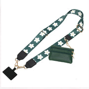 Green floral strap with a small green purse on a white background