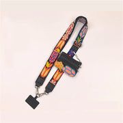 Colorful lanyard with attached wallet on a light pink background