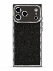A black glitter phone case with a silver metallic border studded with clear rhinestones, shown on a white background.
