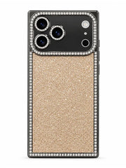 A gold glitter phone case with a black bumper frame adorned with clear rhinestones, shown on a white background.