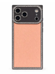 A protective phone case with a textured rose gold back panel and a silver rhinestone-studded border, shown on a white background.