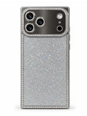 A silver glitter phone case with a sparkling rhinestone border, shown on a smartphone against a white background.