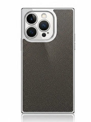 Phone case with textured back and metallic trim on a white background