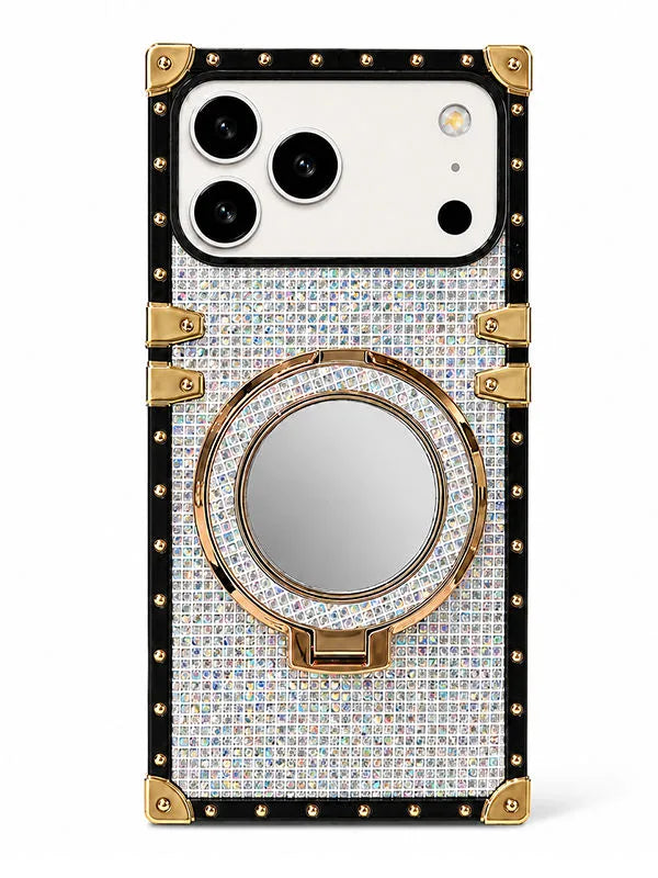 A luxury phone case featuring a rhinestone-embellished back cover, a built-in circular mirror on a kickstand, and gold-tone metal corner protectors and trim.