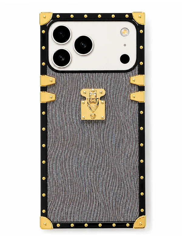 A luxury-style phone case designed for a triple-camera smartphone, featuring a textured gray and black wavy pattern with gold-tone metal studs, corner protectors, and a central clasp lock.
