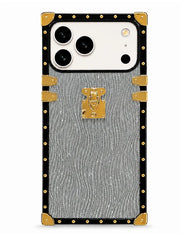 A protective phone case designed for a Google Pixel, featuring a textured gray and silver wavy pattern, a black border, gold corner accents, and a gold central clasp, shown on a plain white background.