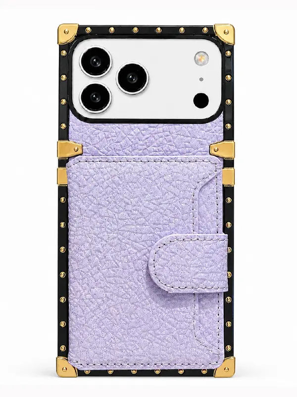 A light purple textured faux leather phone case with a snap-button flap pocket and gold-tone metal corner protectors and studs, shown on a white background.