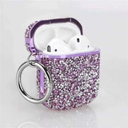 Purple Glittery AirPods Case with open lid, white earbuds and silver-tone ring clip