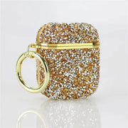 Upright gold Glittery AirPods Case with sparkling finish and circular ring clip