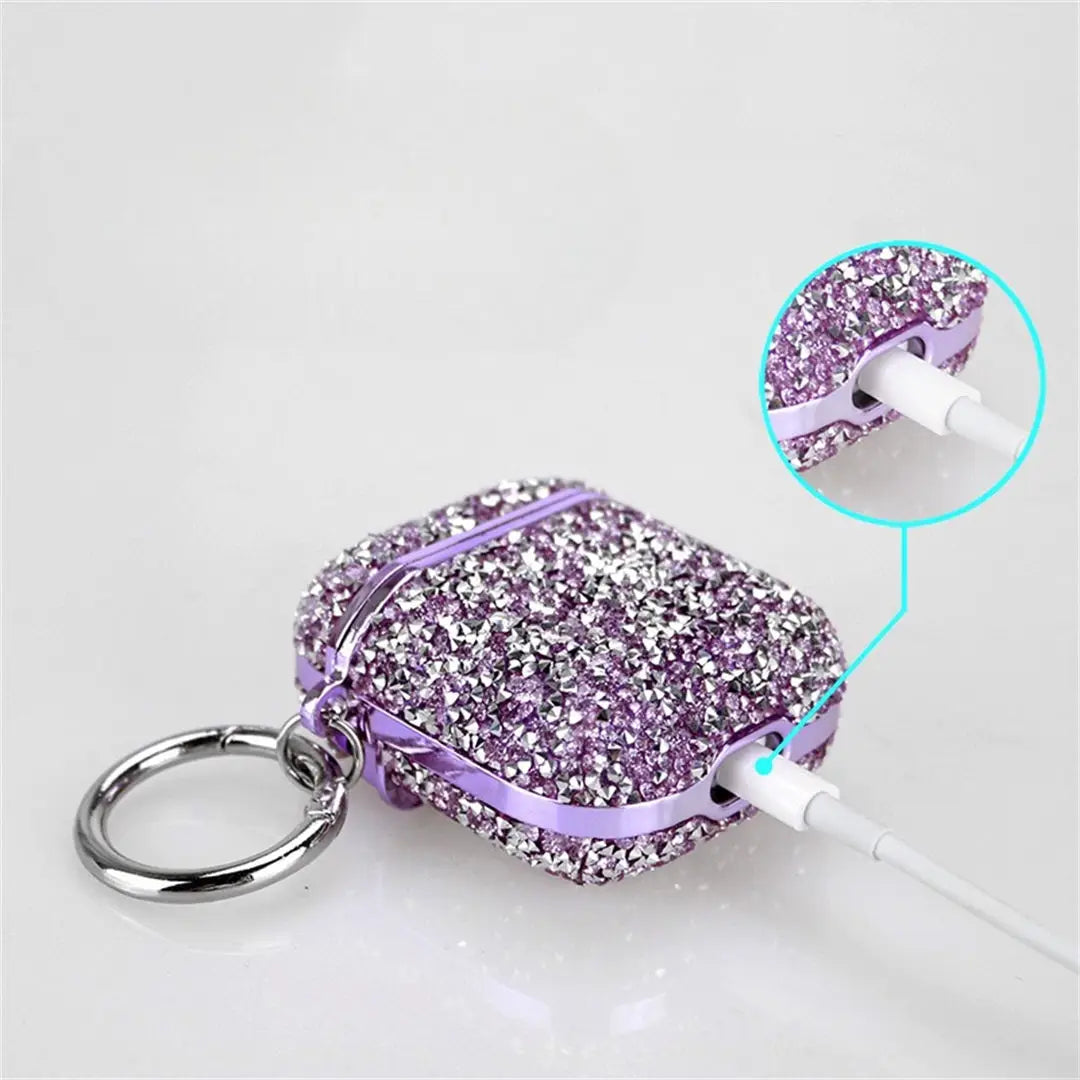 Purple Glittery AirPods Case connected to a charging cable, showing access to the charging port